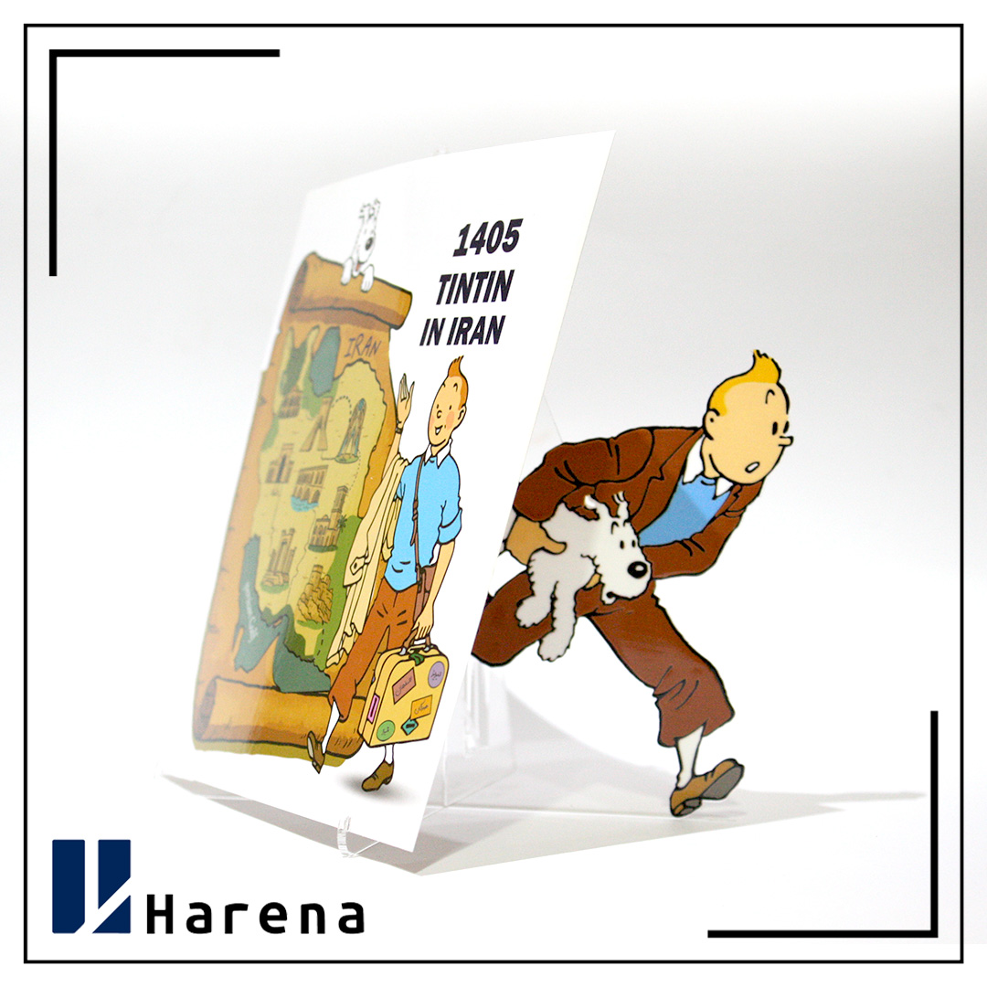 تقویم رومیزی تن تن 1405 سایز بزرگ مربع با پایه فیگور همراه با سفرنامه تن تن در ایران